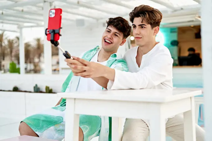 Young Gay Couple Live Streaming Themselves Using Phone