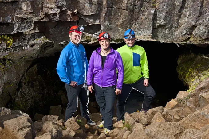 scientists at the entrance of Leidarendi lava cave in Iceland