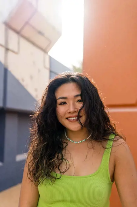 Colorful portrait of a beautiful Asian woman smiling