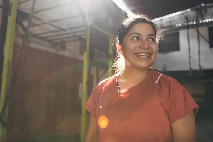 Sweaty latin woman after working out in the gym. Peru.