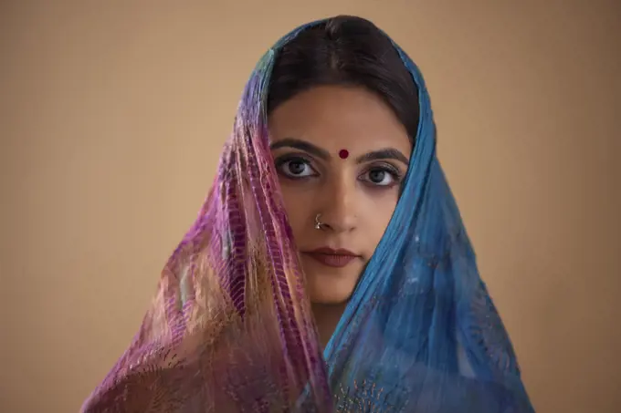 Portrait of an Indian woman in colourful veil