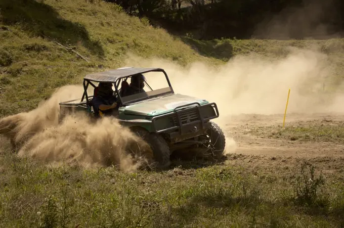 Four Wheel Drive vehicles racing on extreme off road course in competition