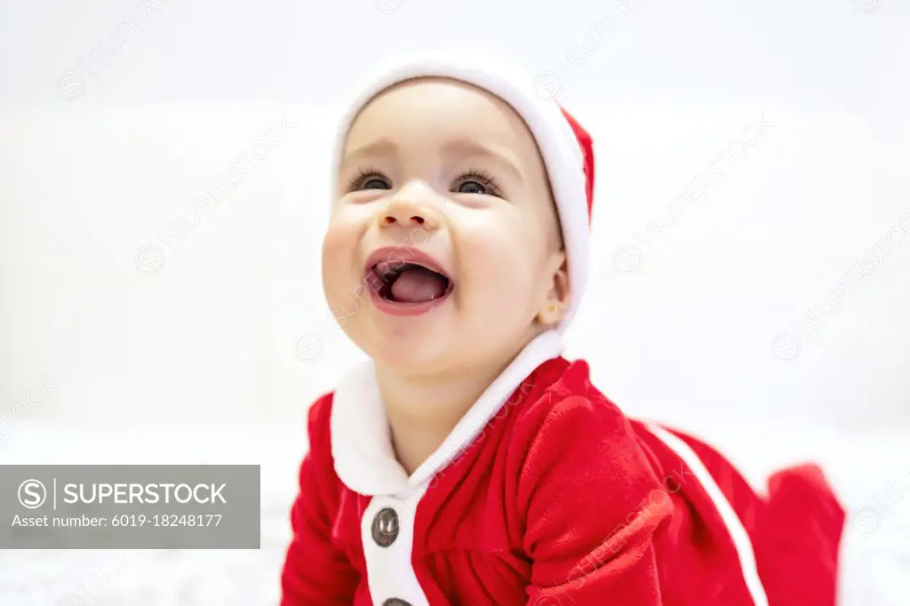 santa claus baby with a beautiful smile