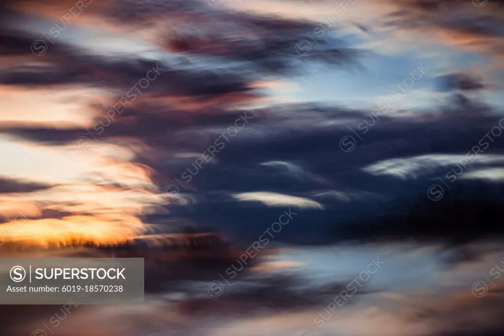 Abstract sunset of a sky and a forest