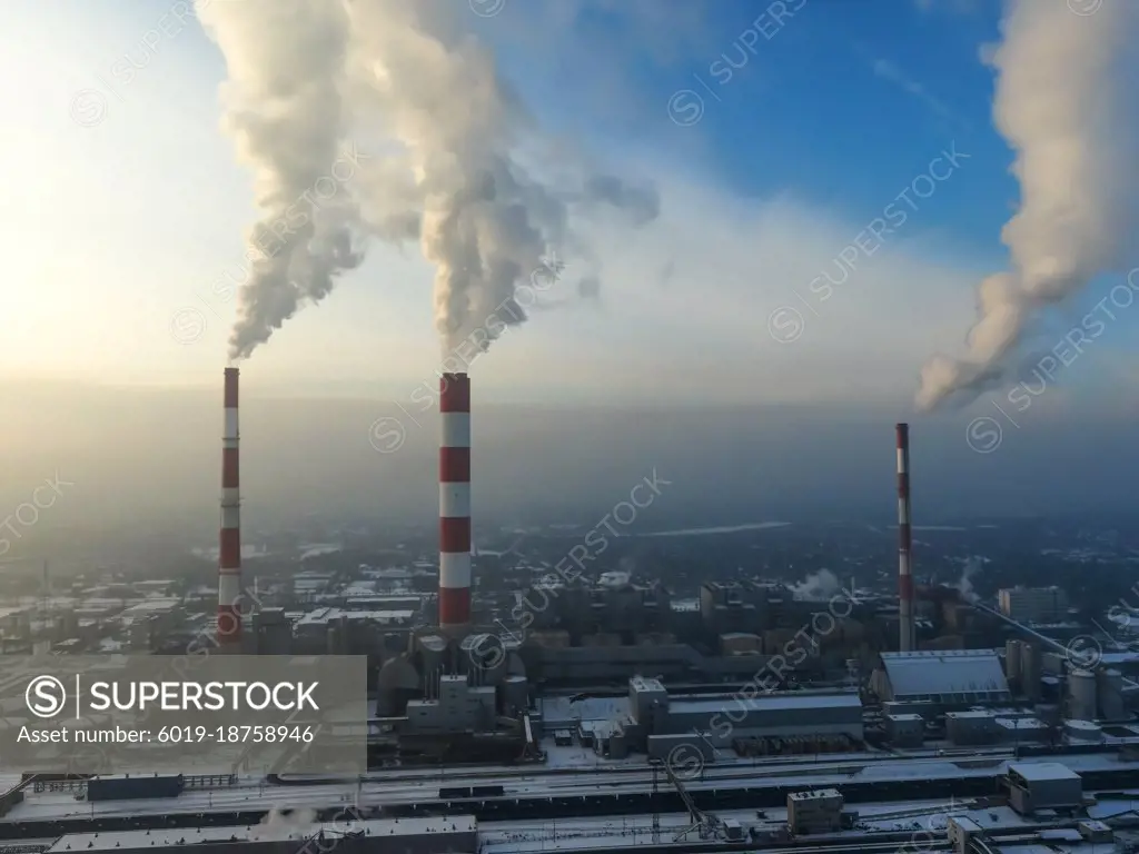 Aerial view of Industrial zone, plants and factories with smoke