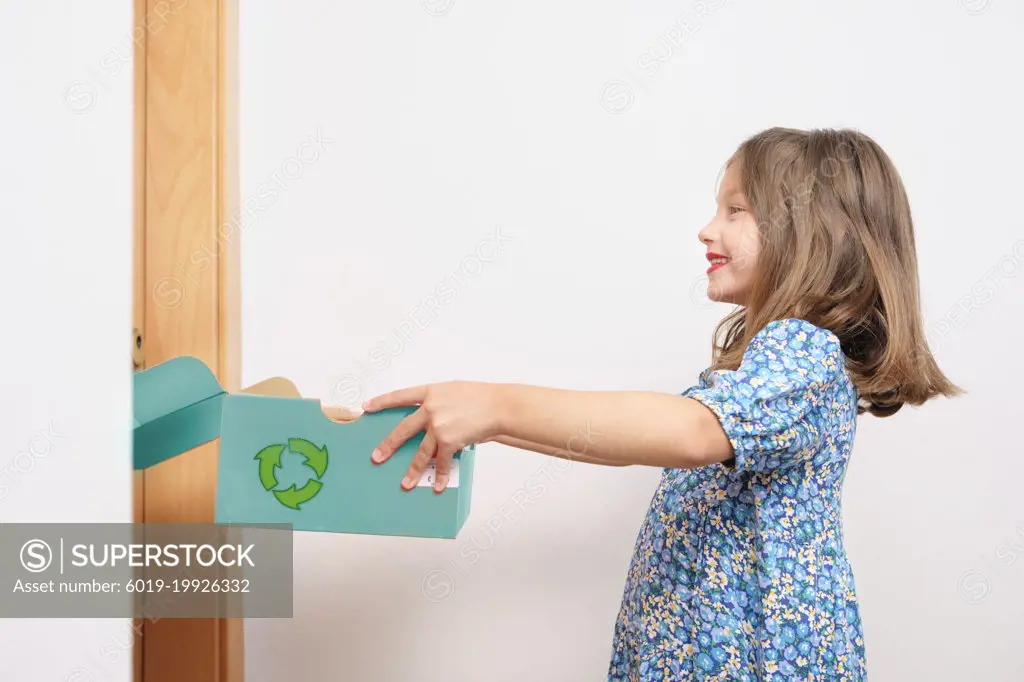 7-year-old girl delivering clothes to the neighbor to reuse.
