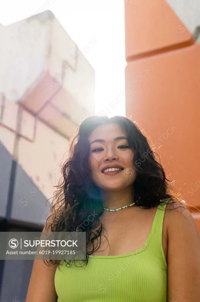 Colorful portrait of a beautiful Asian woman smiling
