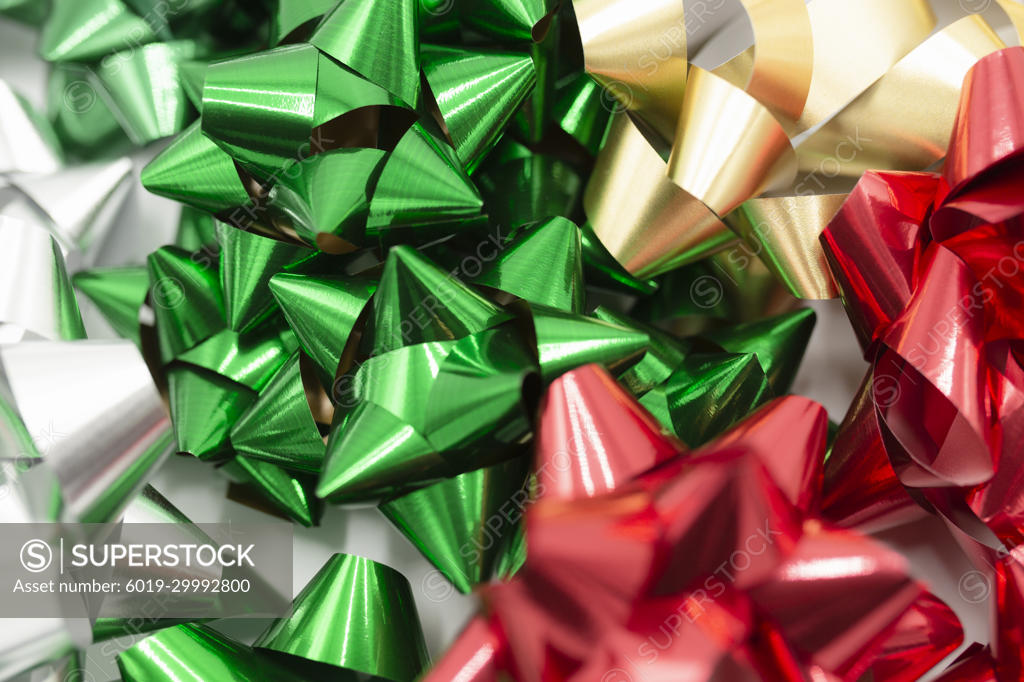 Close-up Group of Red, Green, Silver, and Gold Bows for Gift Wrapping -  SuperStock