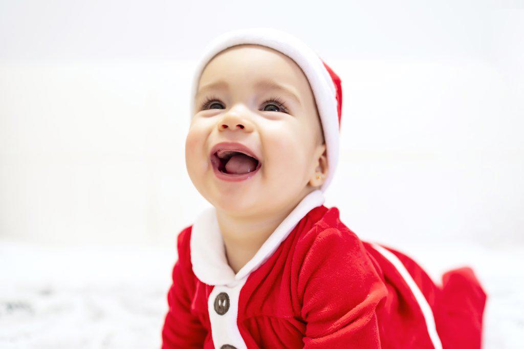 santa claus baby with a beautiful smile