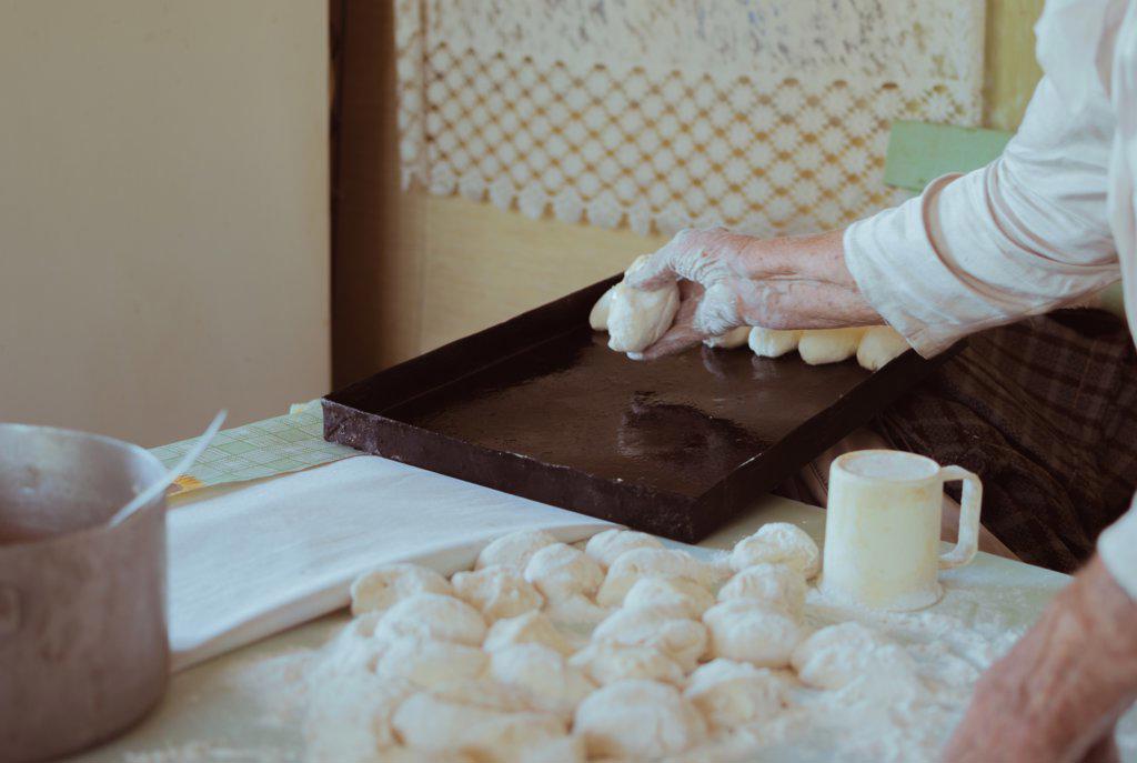 90-year-old grandmother makes pies with potatoes out of dough