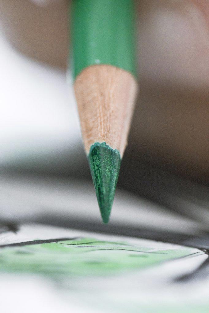 Drawing with green pencil  macro