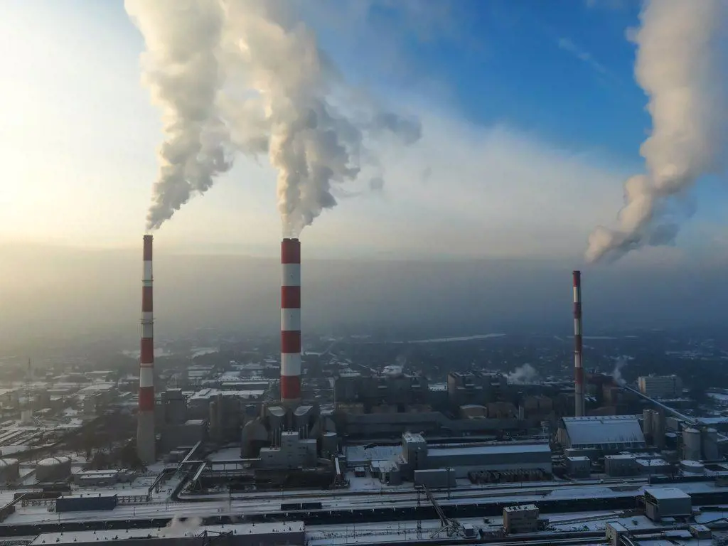 Aerial view of Industrial zone, plants and factories with smoke