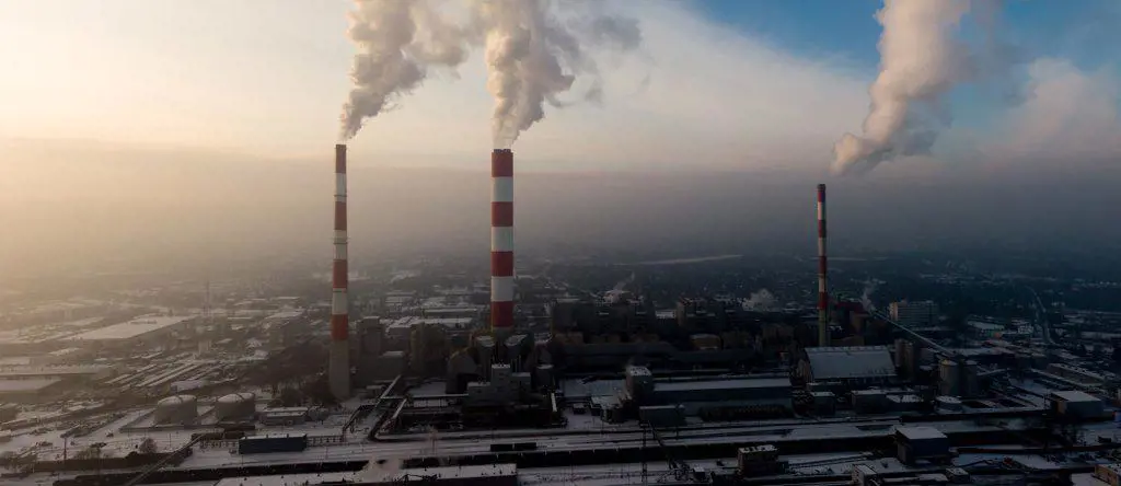 Aerial view of Industrial zone, plants and factories with smoke 