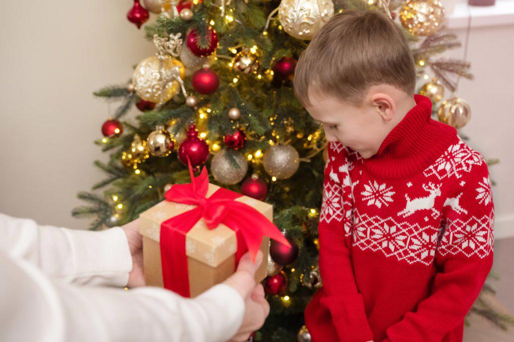 embarrassed grandson receives a christmas present