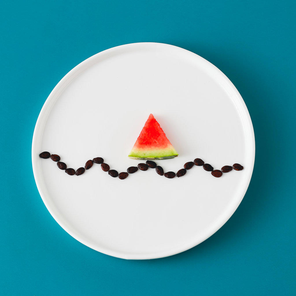 art photography, summer mood,  a piece of watermelon on white plate