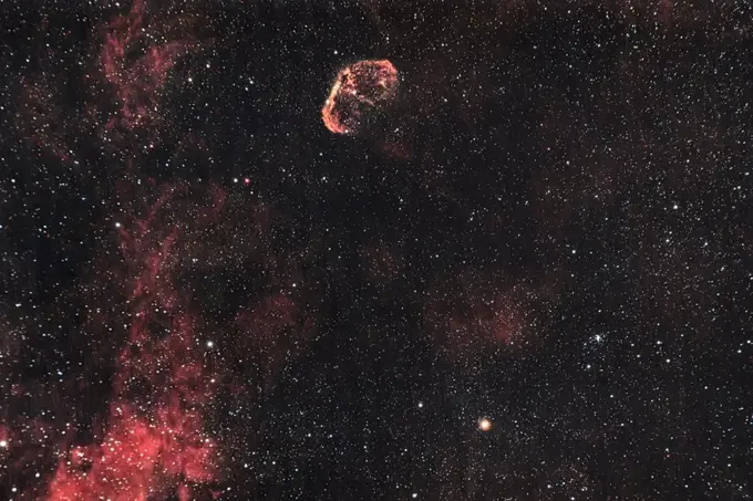 NGC 6888, Crescent Nebula in a dark sky