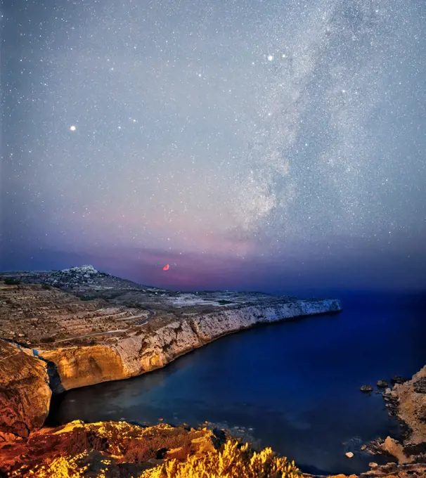Crescent Moon setting over Fomm ir-Rih Bay in Malta