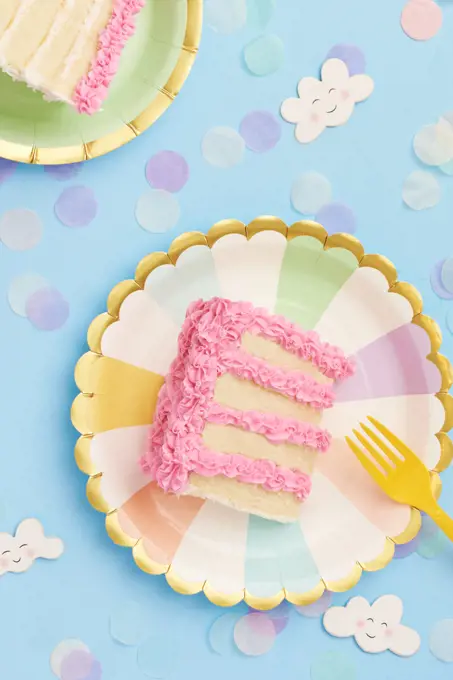 Cake on Paper Party Plates with Confetti and Clouds Spring