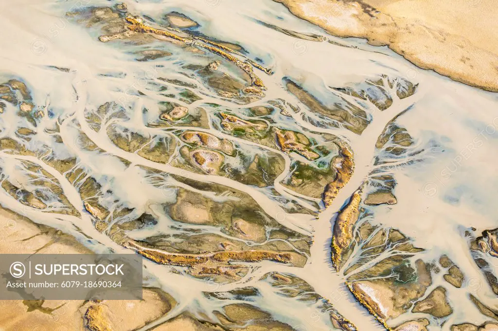 Abstract aerial of Kati Thanda Lake Eyre arid desert land in Australia with small river 