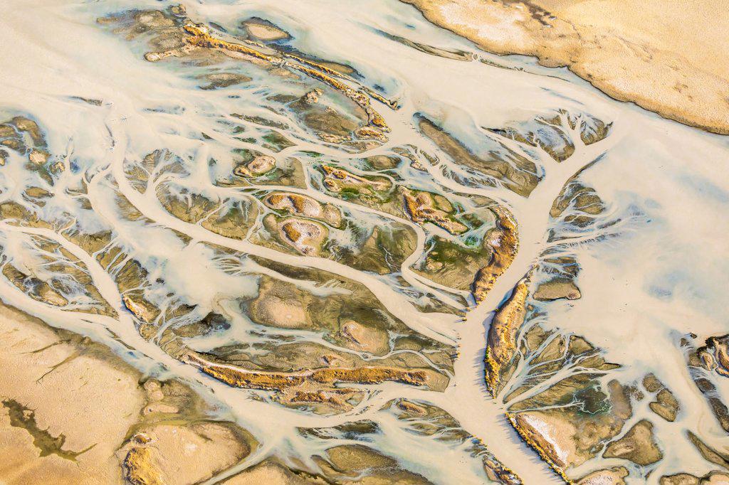 Abstract aerial of Kati Thanda Lake Eyre arid desert land in Australia with small river 