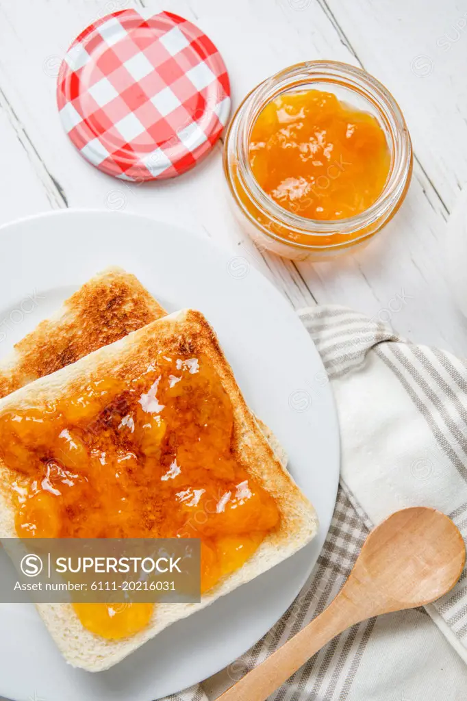 Breakfast of toast with peach jam