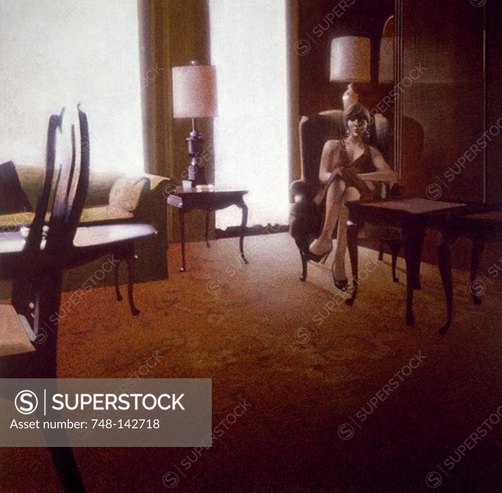 Stock Photo: 748-142718 Young woman wearing smart dress sitting in lounge