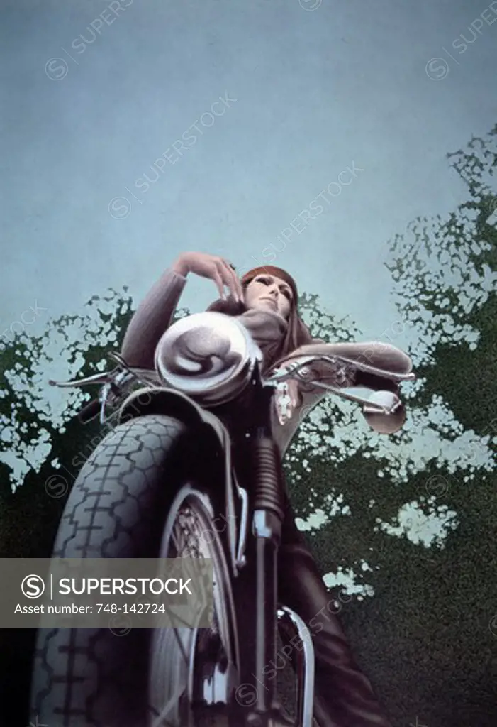 Beautiful sitting on motorbike with trees in blossom in background