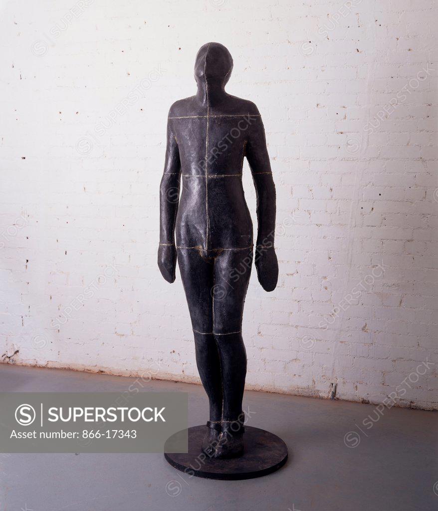 Stock Photo: 866-17343 Standing Man. Antony Gormley (b.1950). Lead, fibreglass, plaster and air. Executed in 1986. 201 x 58.5 x 35.5cm.