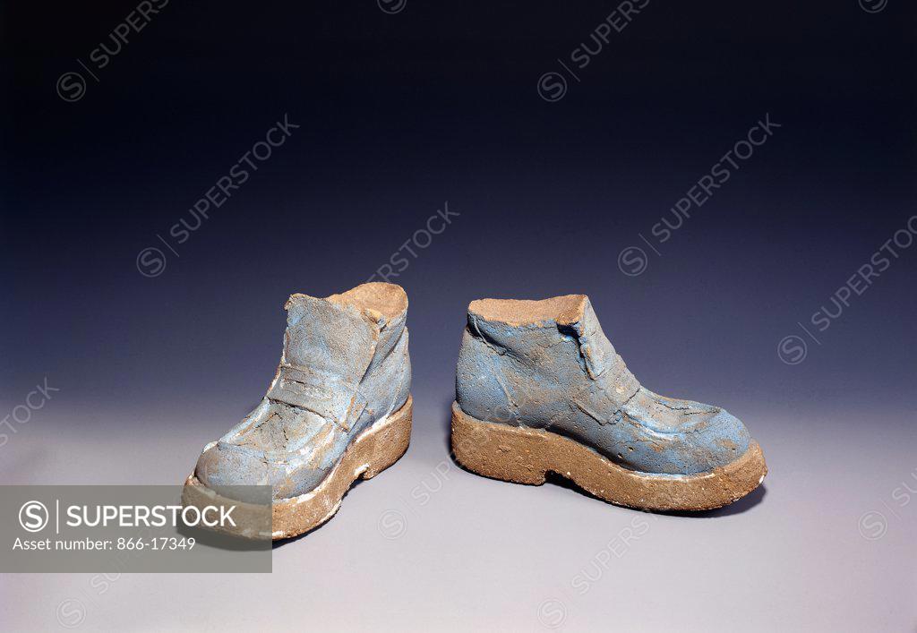 Stock Photo: 866-17349 Boots. Sarah Lucas (b.1962). Painted concrete. Executed in 1996. 15.5 x 11.5 x 26.7cm.