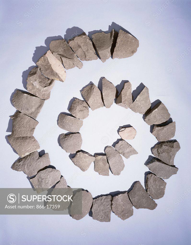 Stock Photo: 866-17359 Small Napoli Spiral.  Richard Long (b.1945). Thirty-three stones. Executed in 1984. diameter approx 137.2cm.