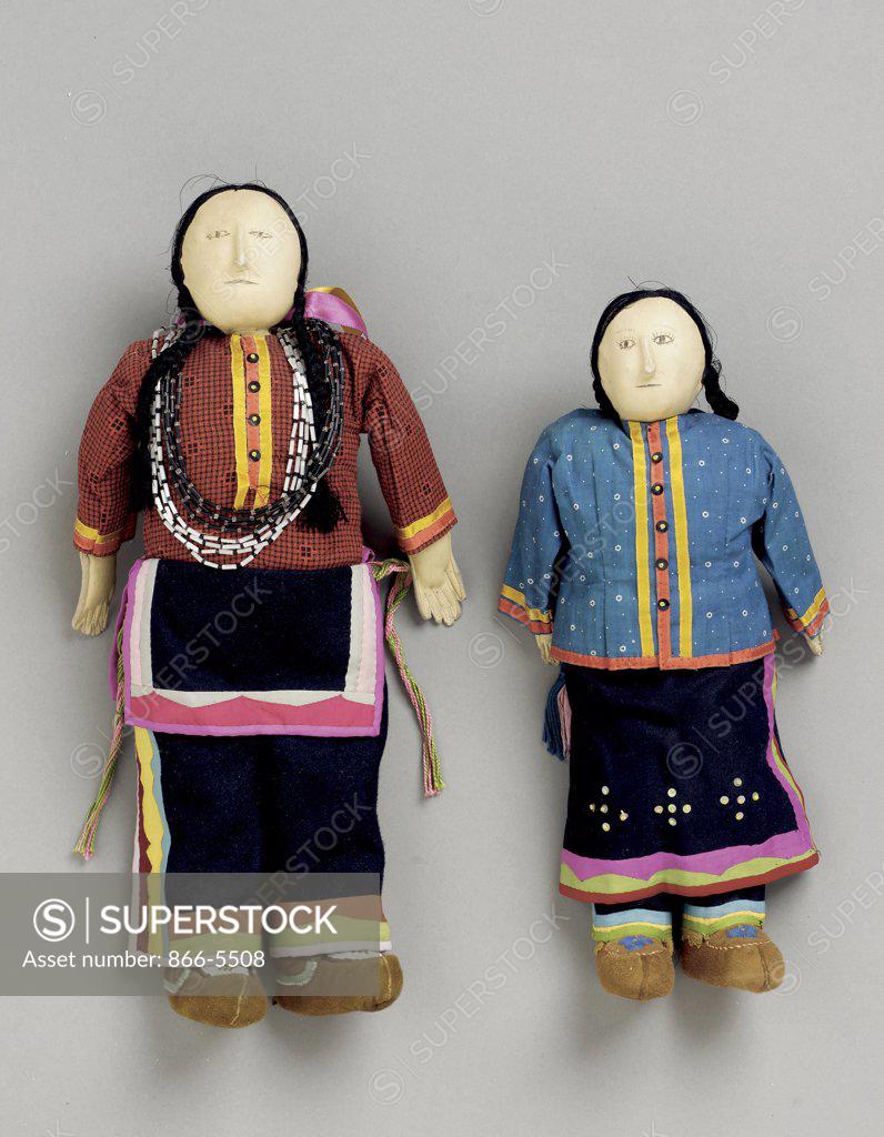 Stock Photo: 866-5508 A Pair of Santee Sioux Beaded Hide and Cloth Dolls Native American Art Beads, cotton and leather