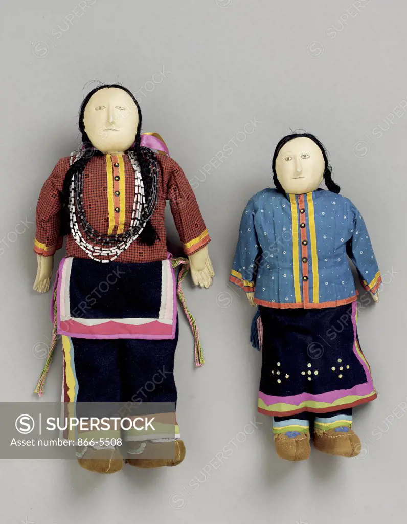 A Pair of Santee Sioux Beaded Hide and Cloth Dolls Native American Art Beads, cotton and leather