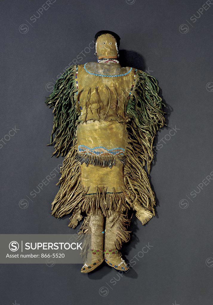 Stock Photo: 866-5520 An Apache Beaded and Fringed Hide Female Doll Native American Art 