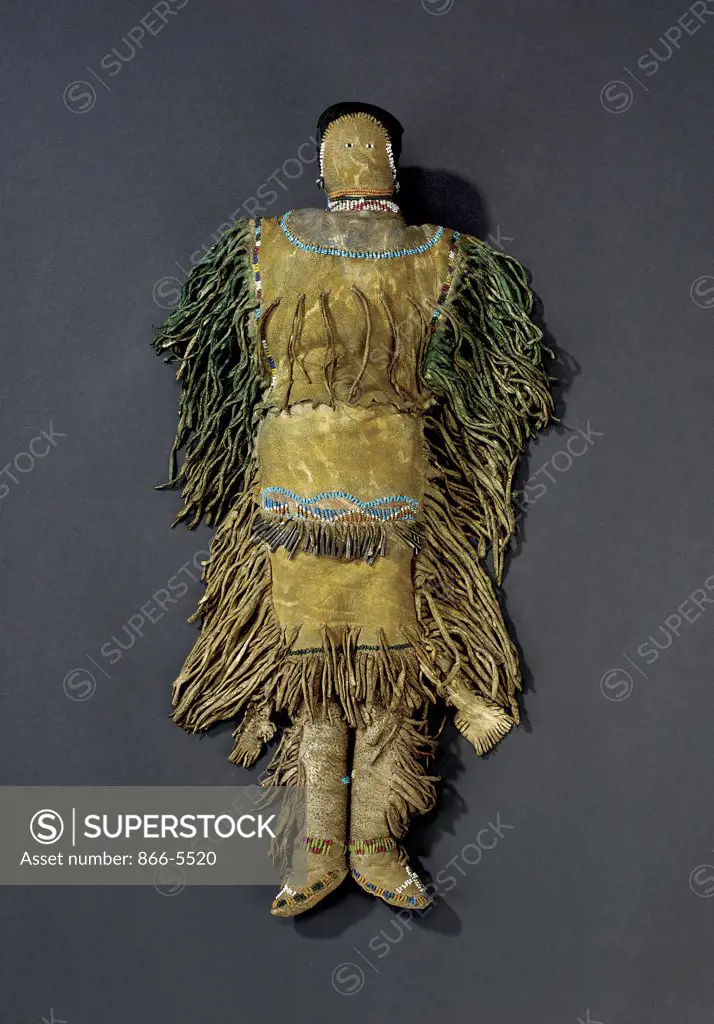 An Apache Beaded and Fringed Hide Female Doll Native American Art 