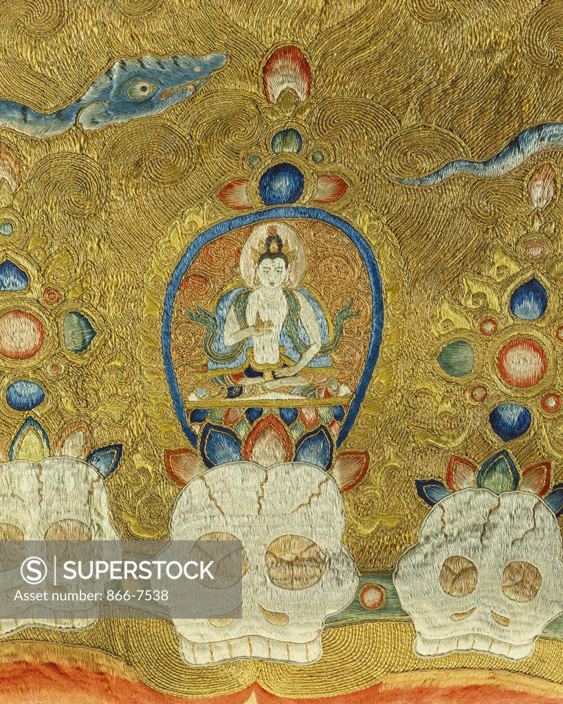 Stock Photo: 866-7538 Detail of a seated Buddha above skulls on the crown of Raktayamari, from a rare and imperial embroidered silk thanka, Yongle period (1403-1424). 335.3 x 213.4cm.