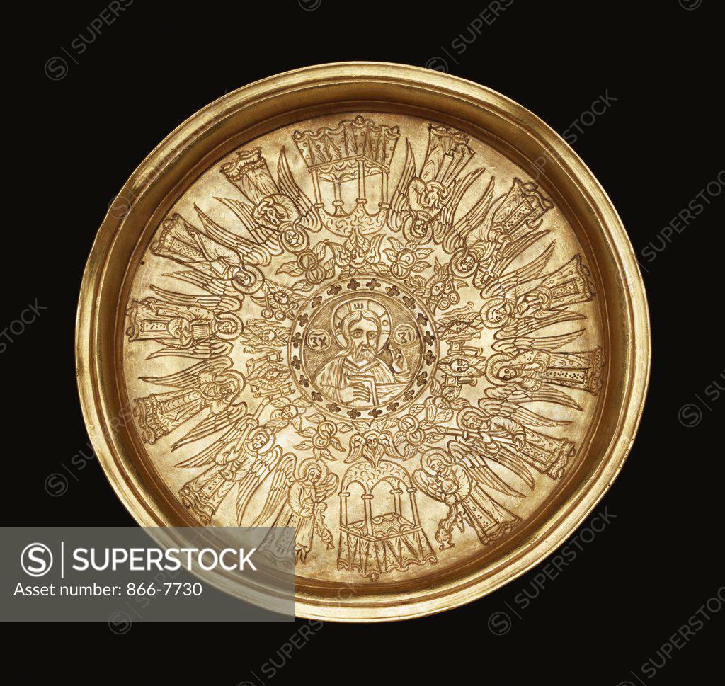 Stock Photo: 866-7730 A gold engraved paten. The centre with a roundel containing the figure of Christ bordered by a narrow band of quatrofoils, surrounded by fourteen cherubim. Probably Greek Orthodox, late 17th/early 18th century, 10.2cm across.