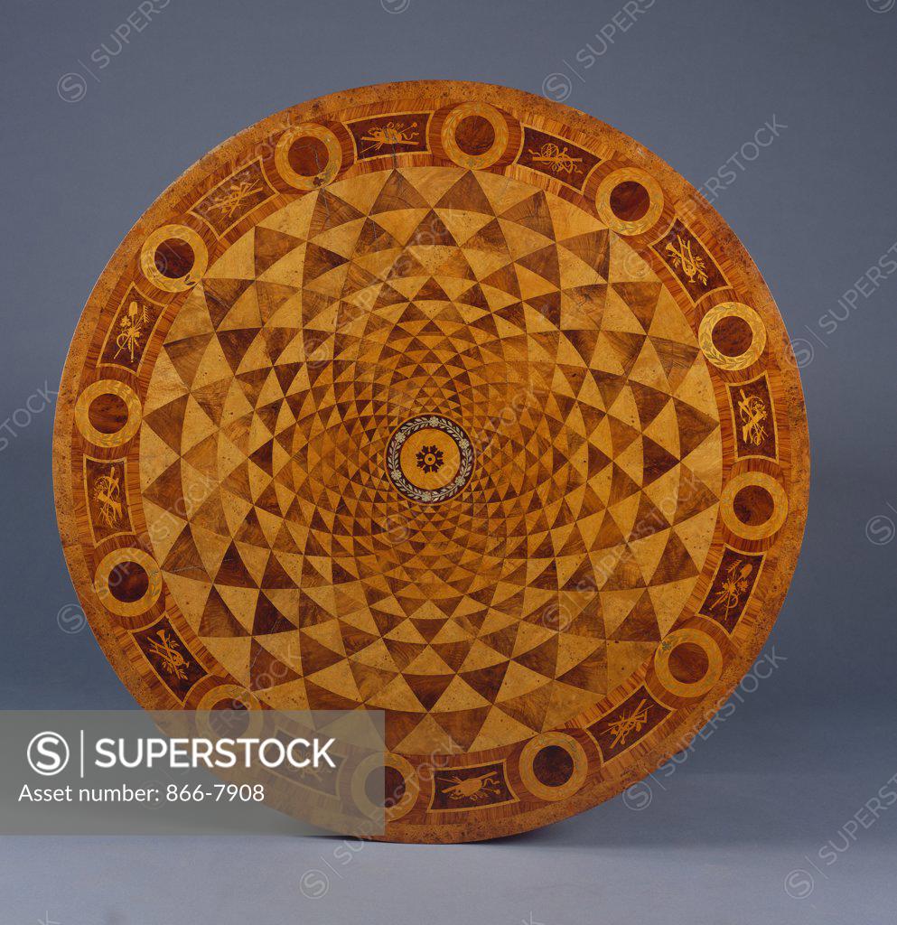 Stock Photo: 866-7908 A Louis XVIII ormolu-mounted burr-elm and marquetry centre table, the circular swivelling top inlaid with a central rosette framed by a mother-of-pearl laurel wreath and a radiating geometrically interlaced petals in maple and mahogany crossbanded with tulipwood. Louis-Francois-Laurent Puteaux (1780-1864). 141cm diam.; 78cm high.