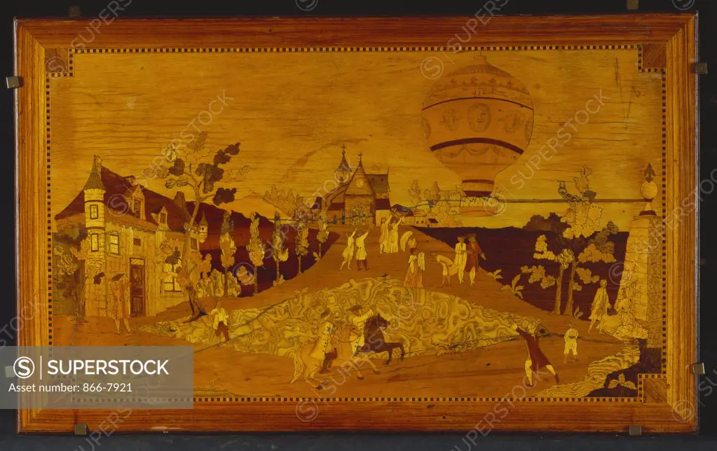 A Louis XVI tulipwood and marquetry table a ecrire, the top depicting the first free flight of the Montgolfier's balloon from the Chateau de la Muette, 73.5cm wide, 78cm high, 45.5cm deep.
