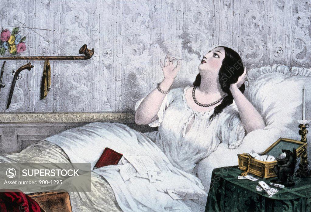 Stock Photo: 900-1295 Waman laying in bed, contemplating,