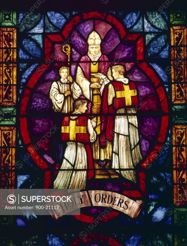 Stock Photo: 900-21117 USA,  New York City,  Our Lady of Pompeii Church,  Stained glass with Holy Orders