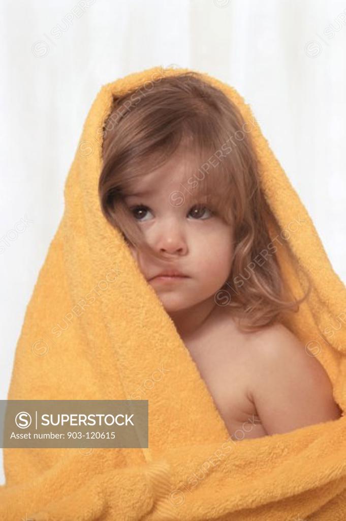 Stock Photo: 903-120615 Young girl wearing a towel around her head