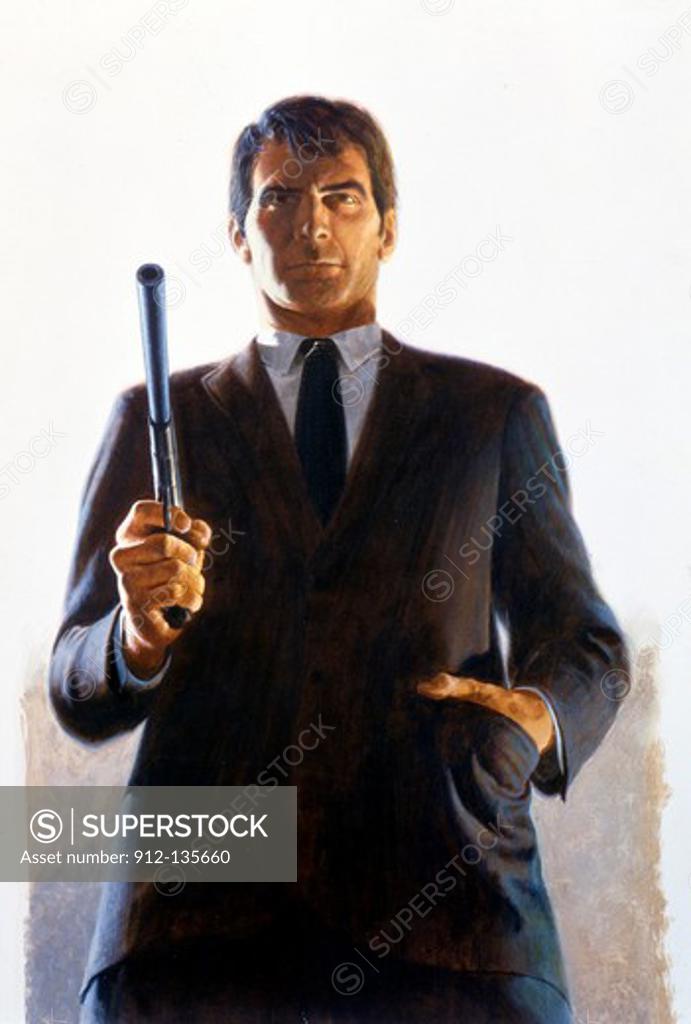 Stock Photo: 912-135660 Man holding handgun with a silencer attached on it
