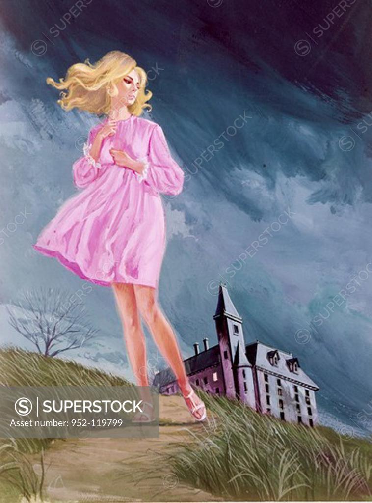Stock Photo: 952-119799 Woman standing on a path with a castle in the background