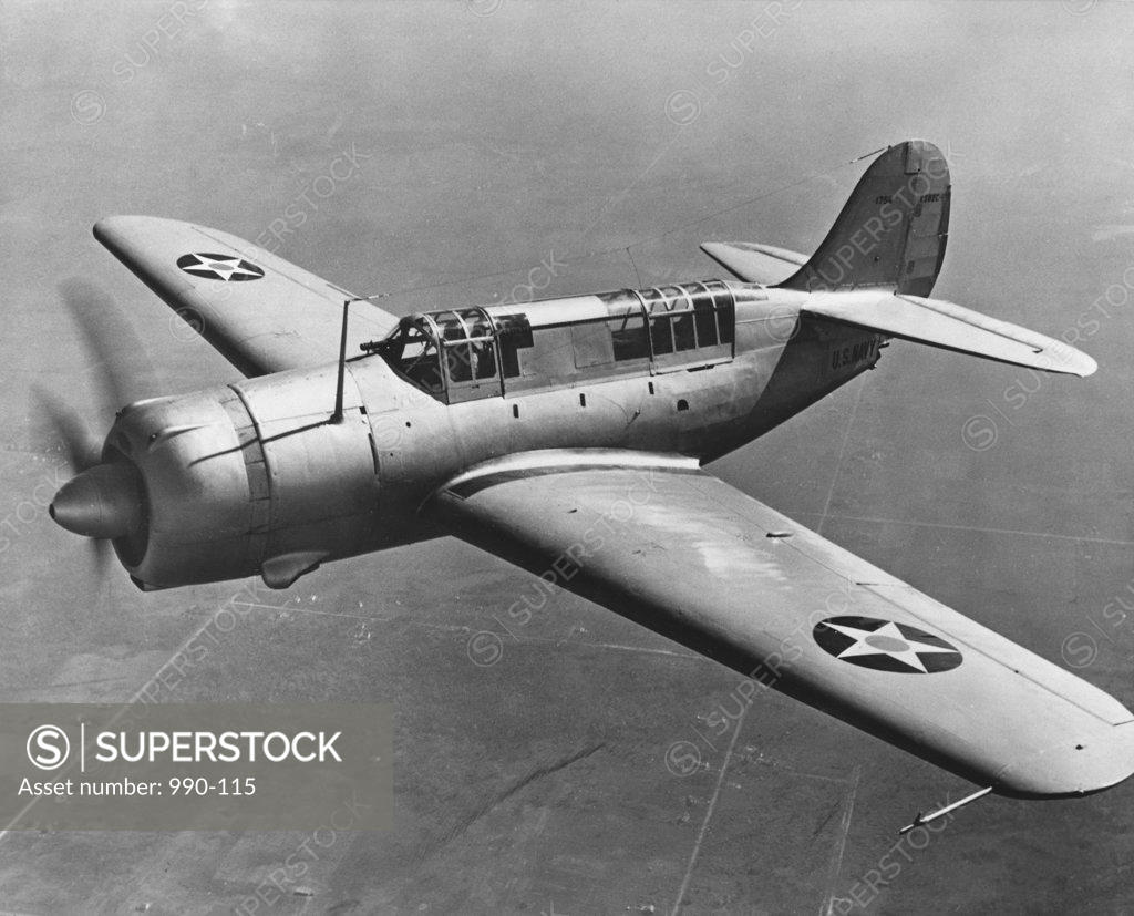 Stock Photo: 990-115 High angle view of a fighter plane in flight, Curtiss SB2C Helldiver, December 1941