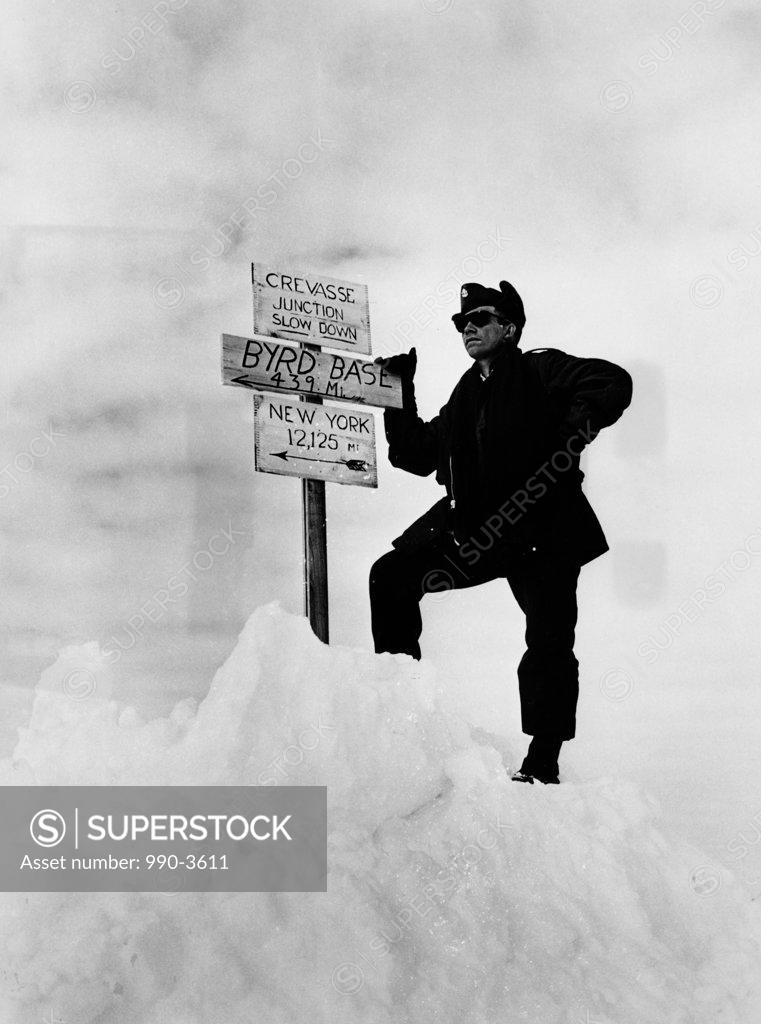 Stock Photo: 990-3611 Antarctica, man standing near information sign
