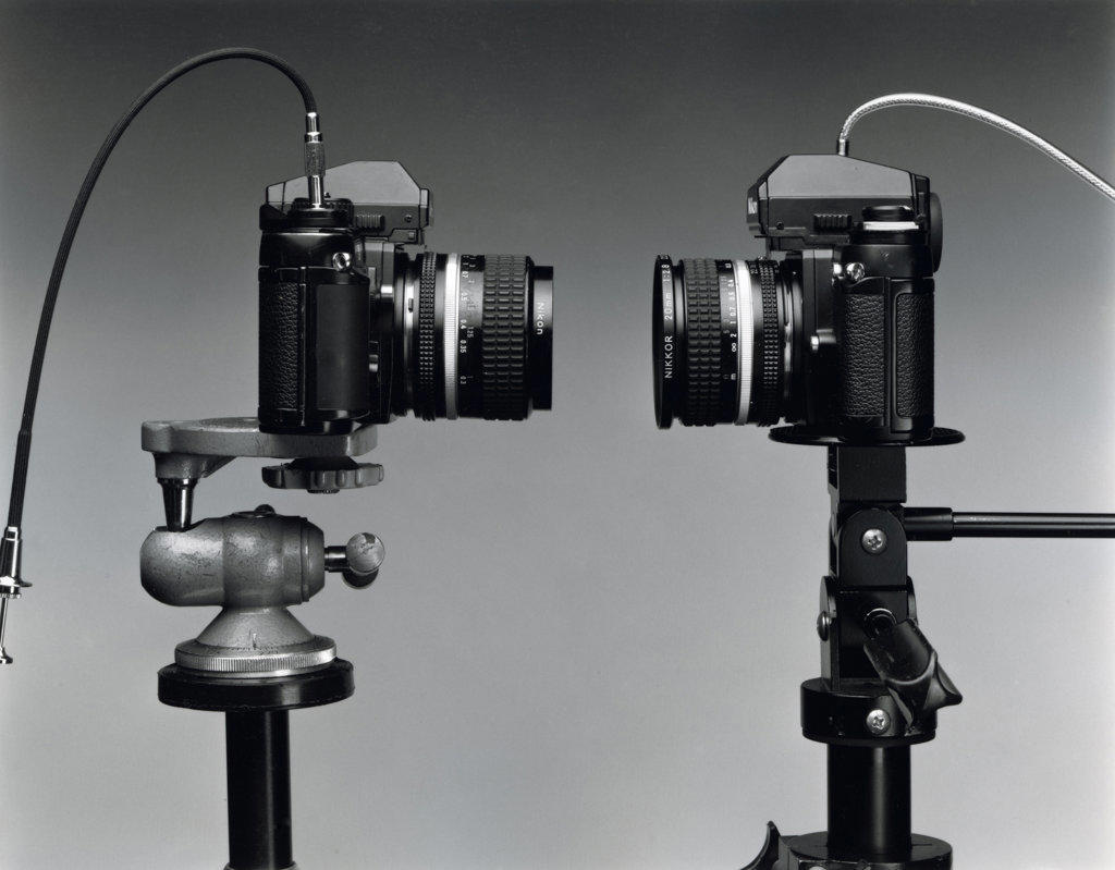 Close-up of two cameras