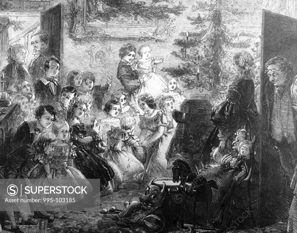 Stock Photo: 995-103185 English Family Gathered Around Christmas Tree by unknown artist